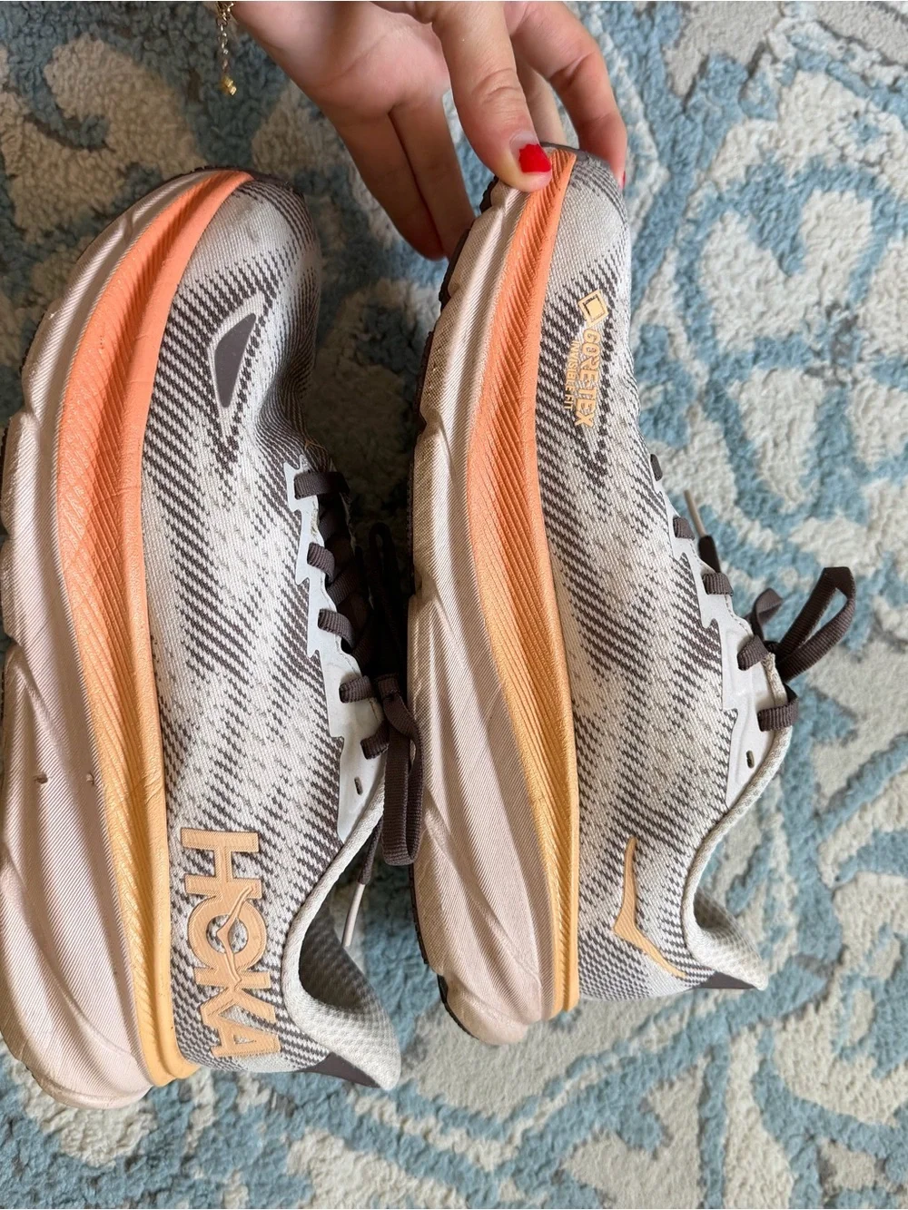 Hoka Women's Clifton Running Shoes in Brown and Orange